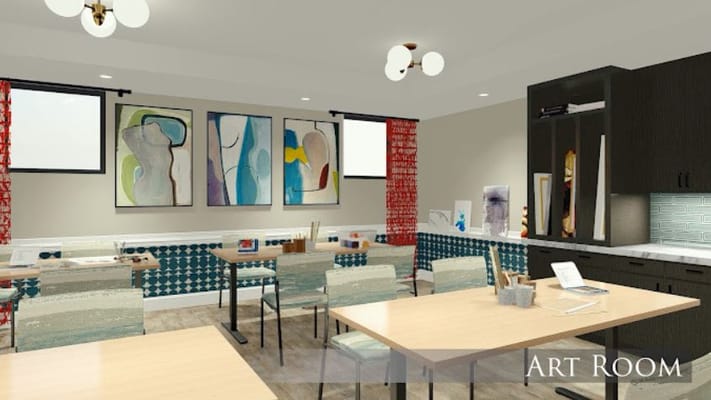 Bright and inviting art room with tables and artwork