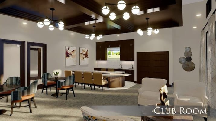 Interior view of the club room with seating and kitchen area