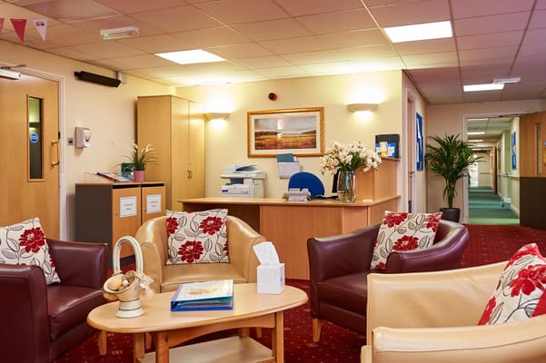 Common area of a care home with seating and decor