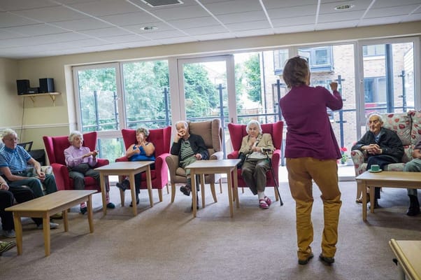 Residents participating in an activity in a common area
