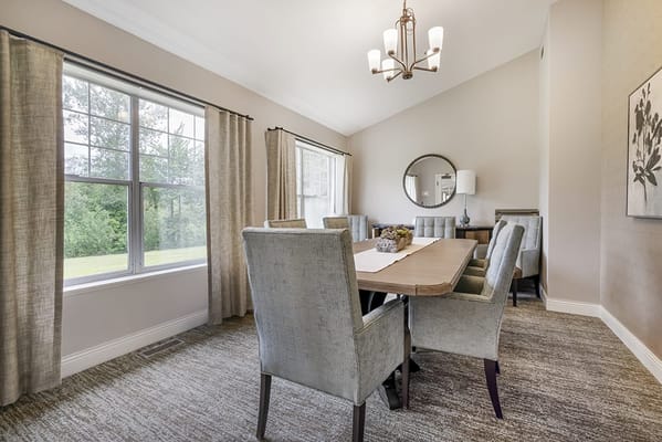 Common area with dining table and chairs