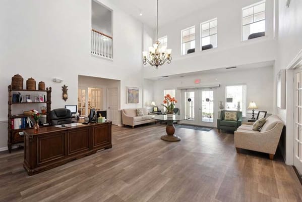 Spacious lobby with seating and reception area