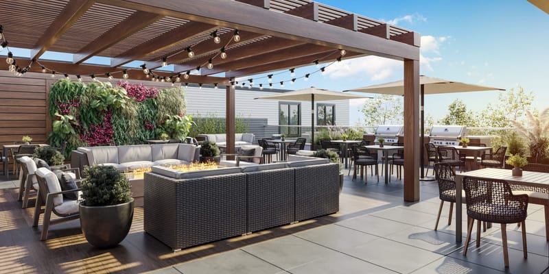 Outdoor social space with seating and greenery