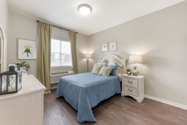 Cozy private bedroom with a bed and decorative items