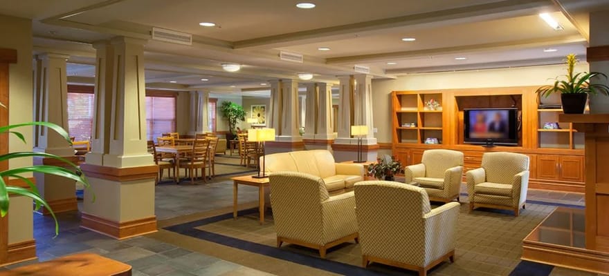 Common area with seating and television