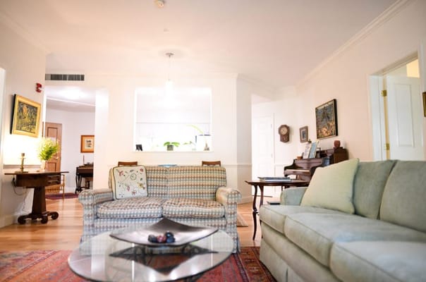 Spacious living room with comfortable seating and a coffee table