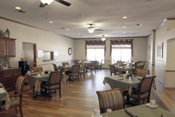 Dining room with tables set for meals