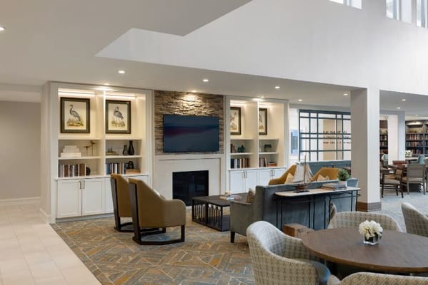 Spacious living room with seating and a television