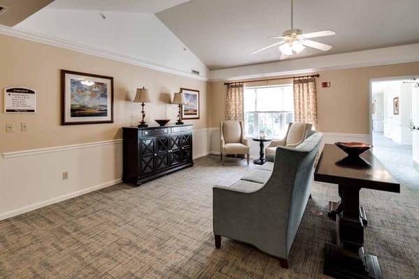 Spacious living room with comfortable seating and decor