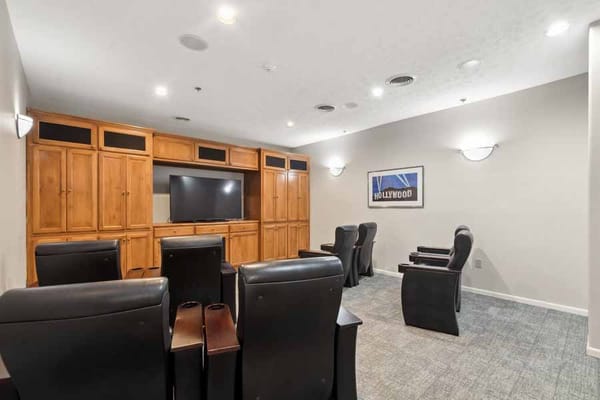Cozy media room with seating and entertainment center