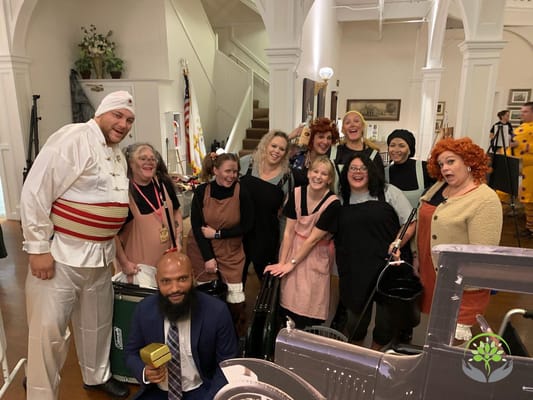 Staff and residents enjoying a themed event in a common area