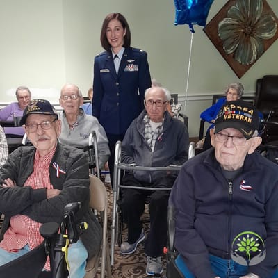 Residents celebrating with a staff member during an event