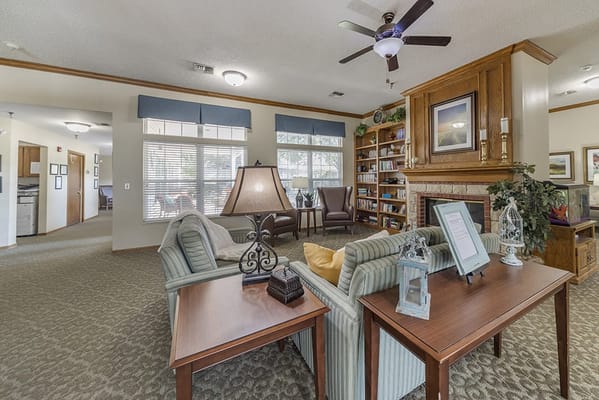 Cozy common area with seating and bookshelves