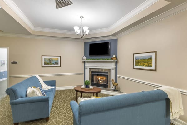 Cozy interior lounge area with a fireplace