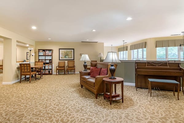 Common area with seating and piano