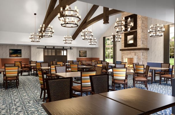 Spacious dining area with wooden beams and chandeliers