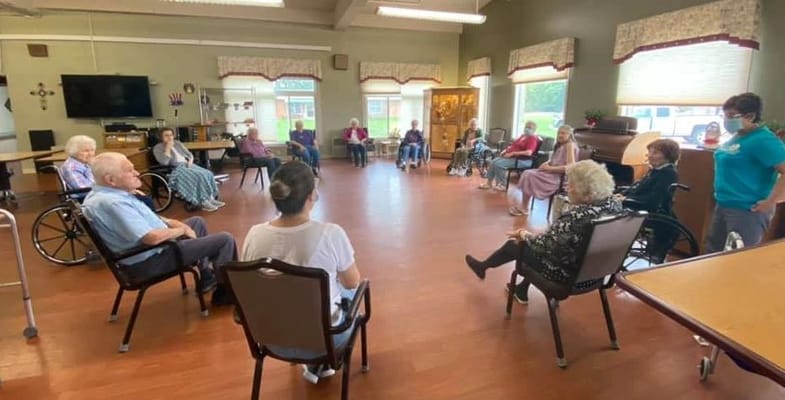 Residents participating in an activity session in the common area
