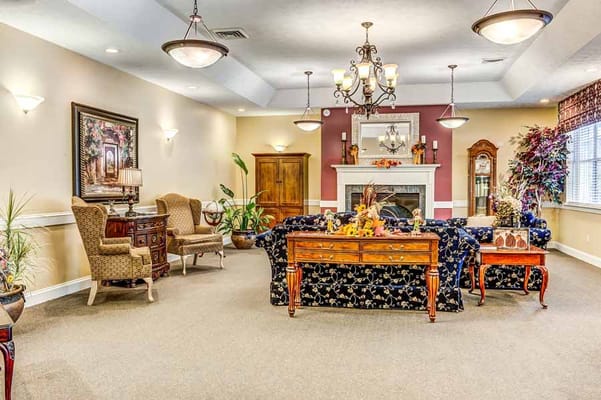 Comfortable living room with seating and decorative fireplace