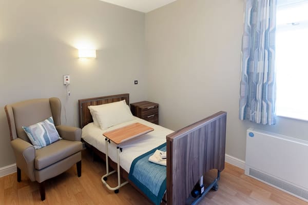 Interior view of a well-furnished resident room