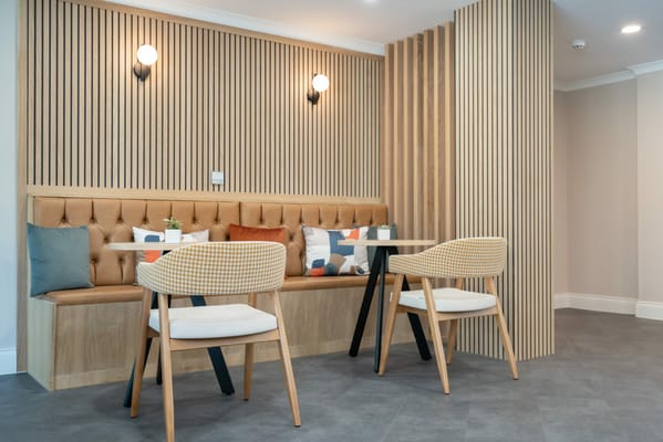 Cozy lounge with seating and wooden accents