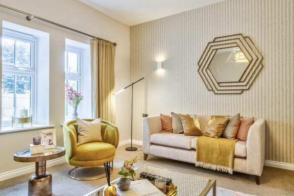 Cozy living room with a green armchair and modern decor