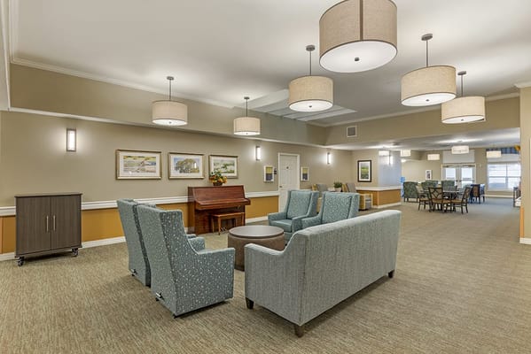 Interior common area with seating and piano
