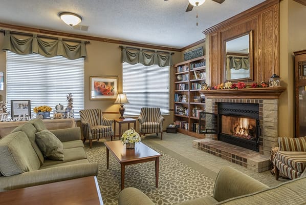 Cozy common area with seating and a fireplace