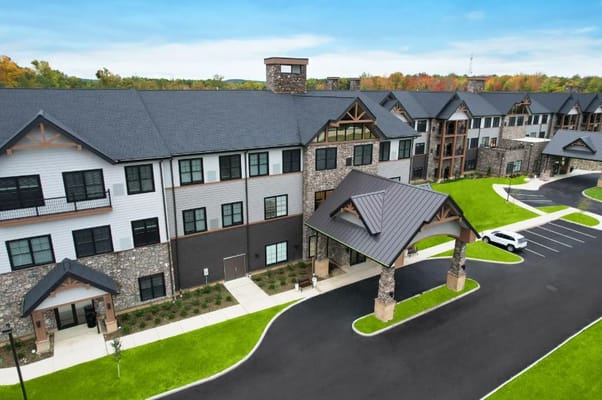 Exterior view of The V Living Experience in Mentor, highlighting architecture and landscaping.