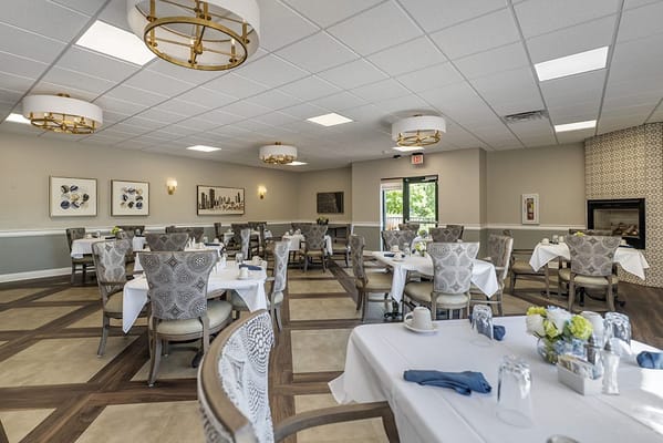 Elegant dining room setup with tables and chairs