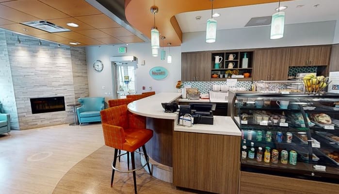 Café area with seating and food display