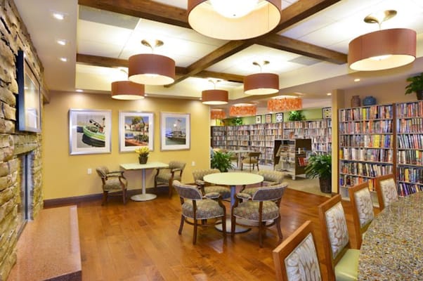 Common area with bookshelves and seating