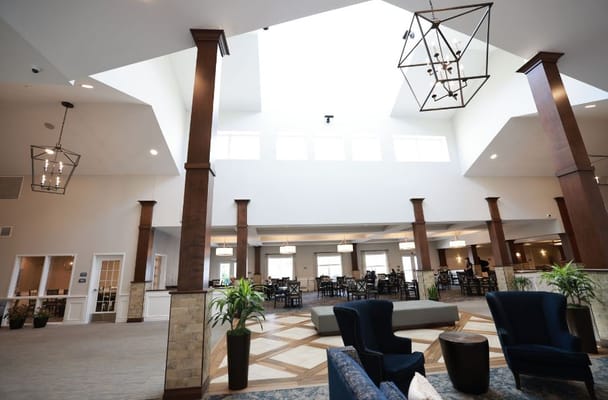 Bright and spacious common area with dining