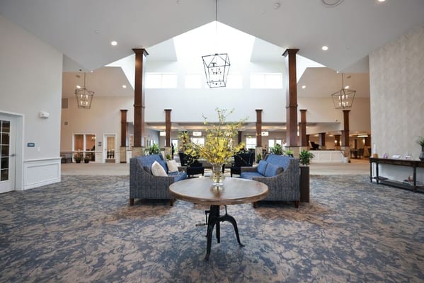 Brightly lit lobby area with comfortable seating