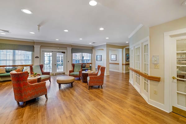 Bright common area with seating and outdoor access