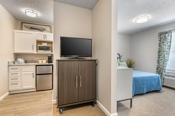 Cozy interior of a resident's living space with kitchenette