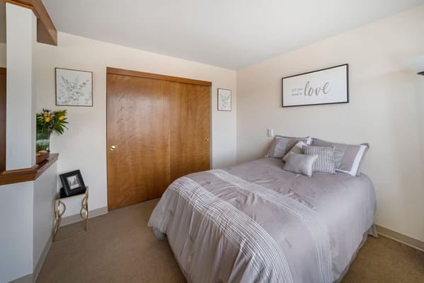 A well-decorated private bedroom in a facility