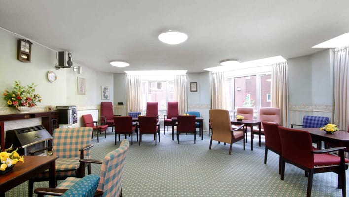 Common area with seating and natural light
