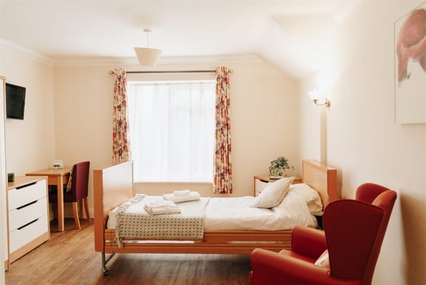 Cozy resident room with comfortable furnishings