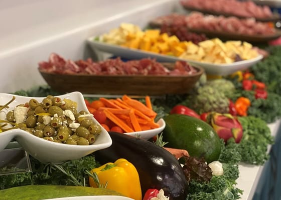 An array of colorful appetizers and snacks displayed on a table