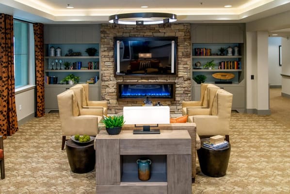 Cozy common area with seating and fireplace