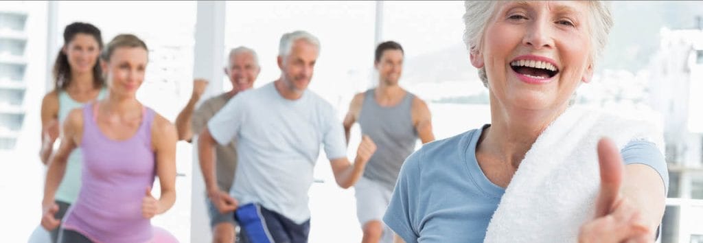 Residents participating in an exercise class with instructors