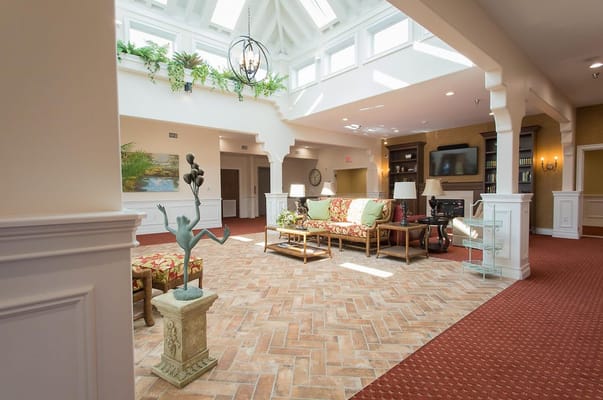 Bright common area with seating and decor