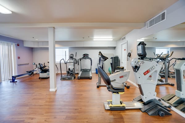 Interior view of a fitness area with exercise equipment