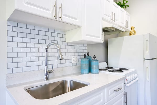 Bright kitchen with modern appliances and decor