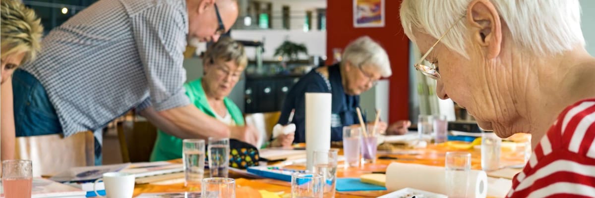 Residents engaged in an arts and crafts activity