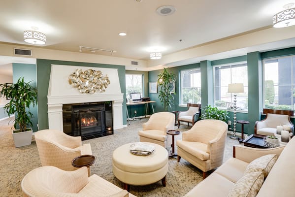 Cozy common area with seating and fireplace