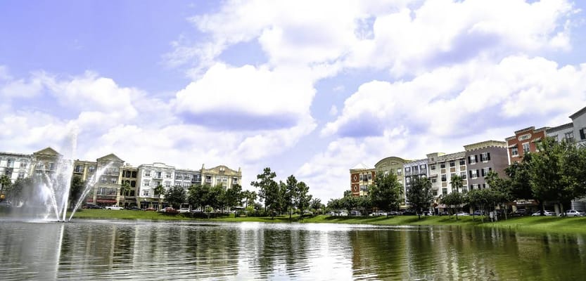 Scenic view of a lake surrounded by buildings