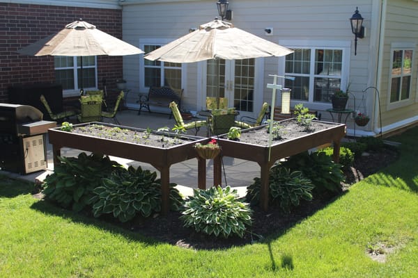 Garden area with seating and umbrellas