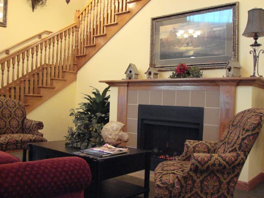 Cozy common area with seating and fireplace
