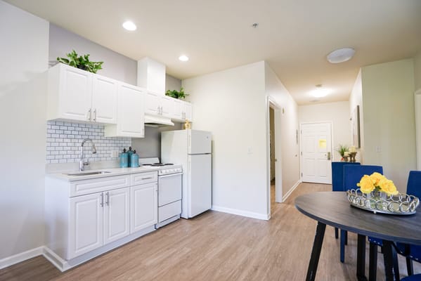 Bright and modern kitchen area in a facility unit